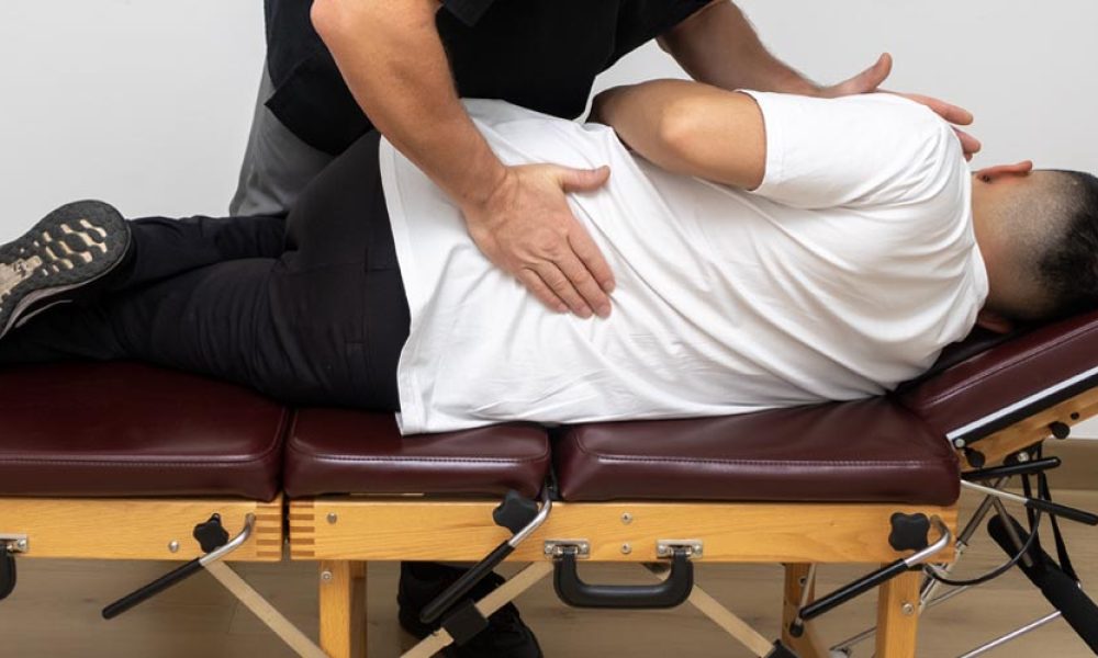 Ajuste lumbar quiropráctico para ciática en Bogotá